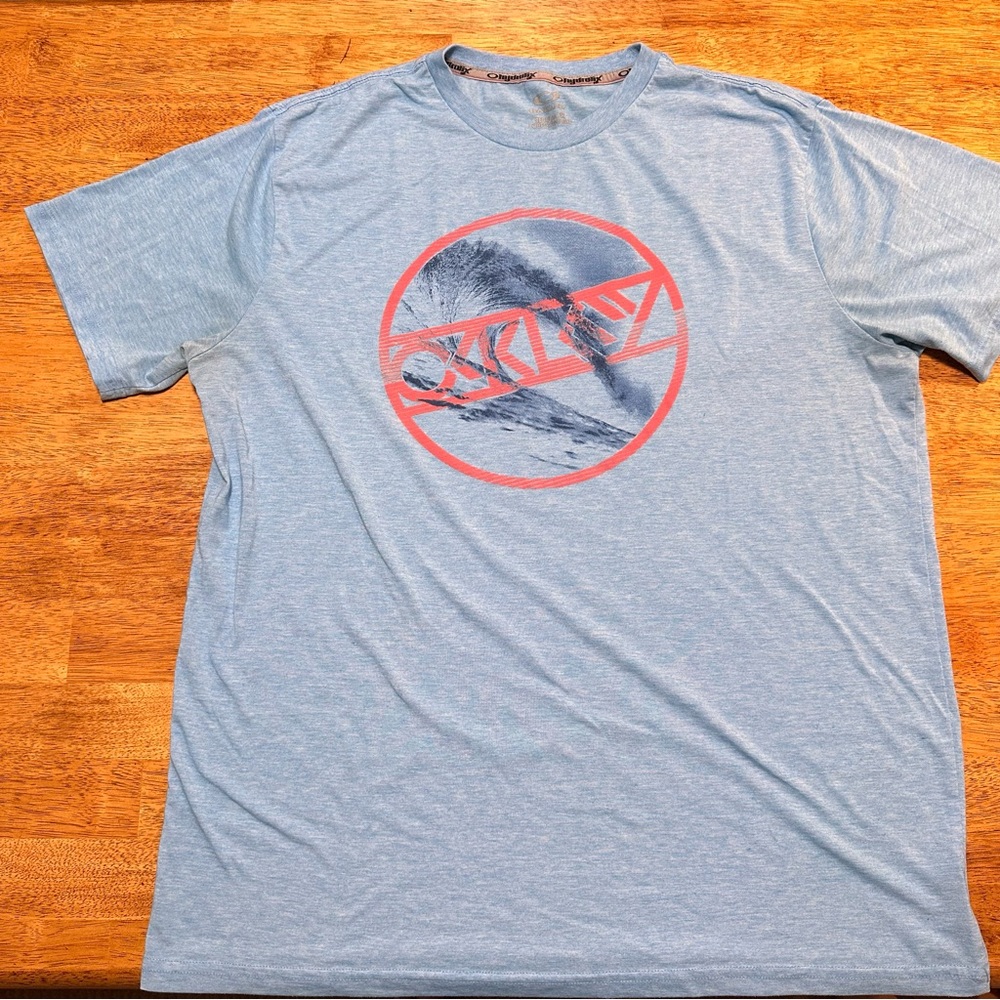 Oakley Light Blue Tee w/ Wave Graphic